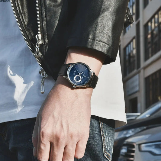 Reloj de cuarzo informal para hombre de PAGANI DESIGN: estilo «lujo accesible», versátil, con cristal tratado, resistente al agua, caja de acero inoxidable y indicador de fecha.