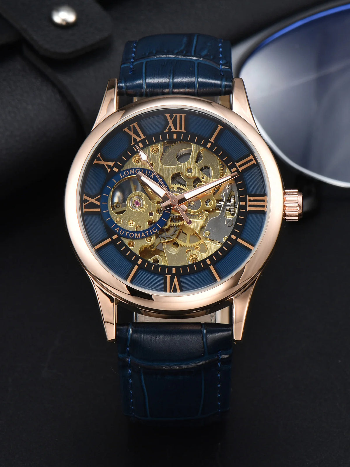 Reloj automático para hombre, estilo de lujo, esfera con números romanos, mecanismo a la vista (esqueleto), resistente al agua, agujas luminiscentes, correa de piel: una opción ideal para regalar.