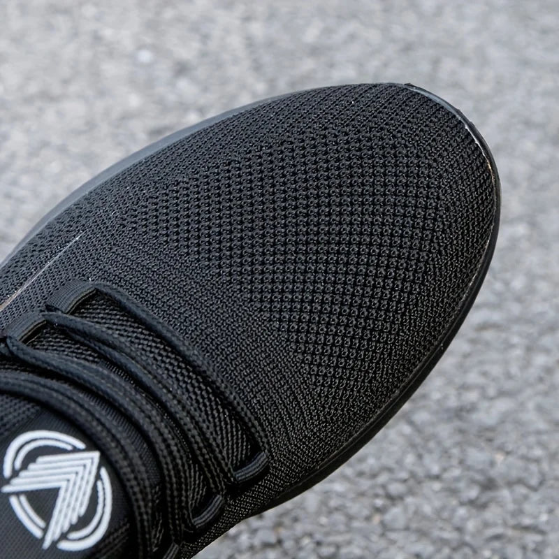 Baskets légères et respirantes en tricot pour hommes, chaussures d'entraînement antidérapantes pour la course à pied, basket-ball, chaussures de sport noires et blanches, semelle en PU